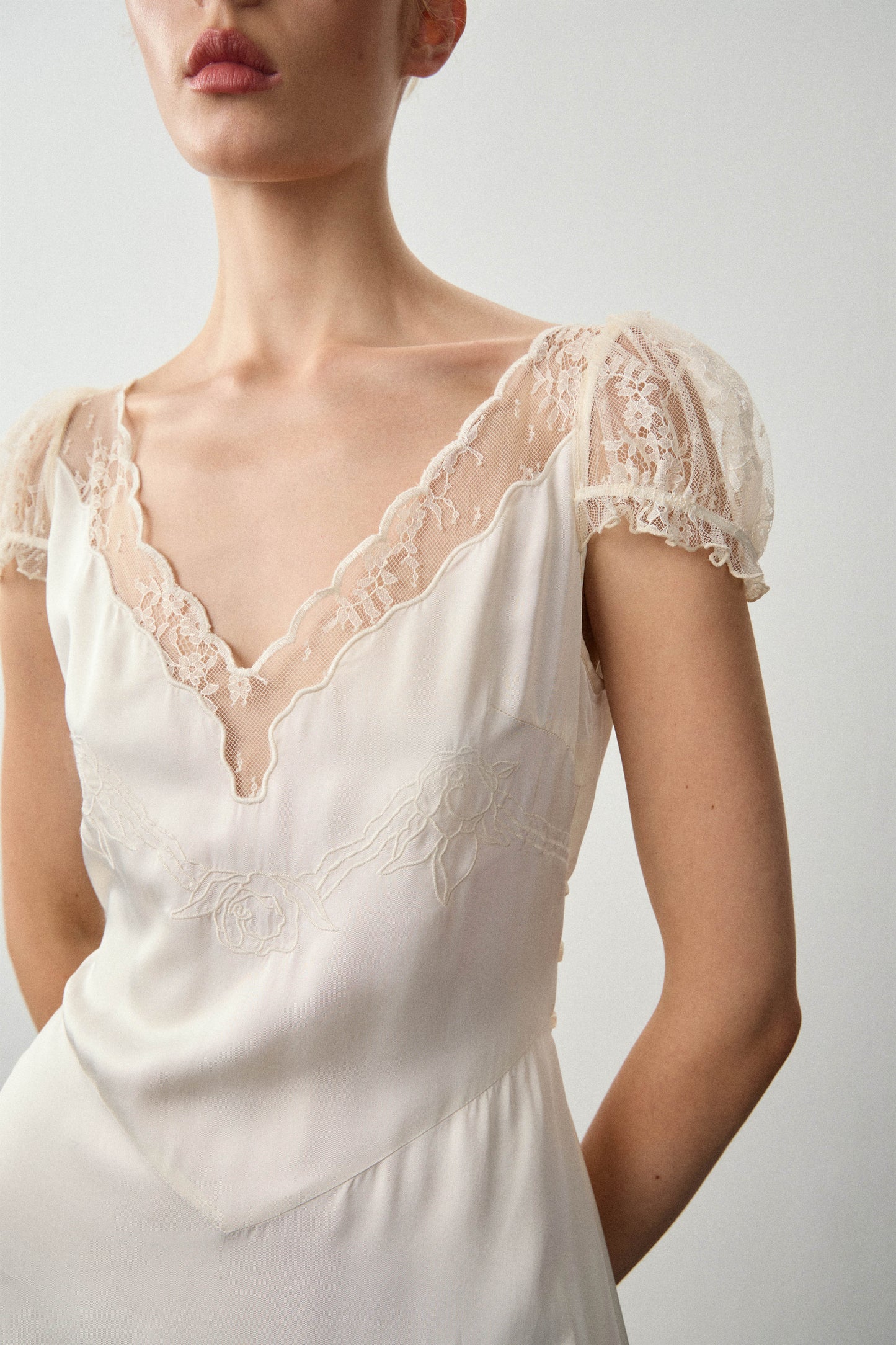 LACE-TRIMMED SATIN DRESS